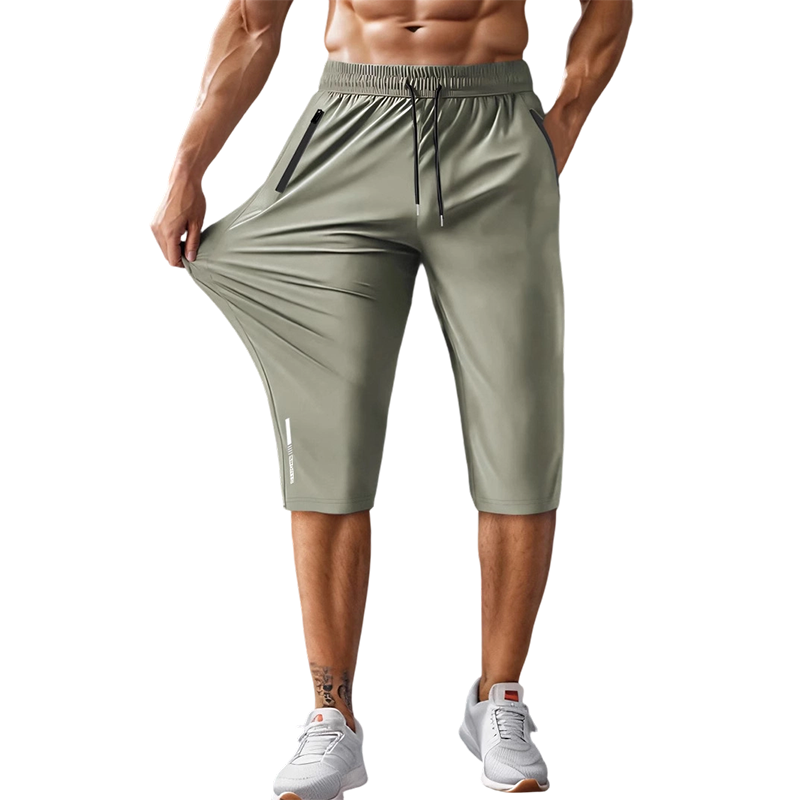 Kastoria — Pantalon Capri de Sport à Séchage Rapide avec Poches Zippées