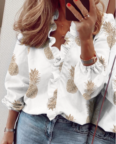 Céleste — Blouse à coupe décontractée avec volants