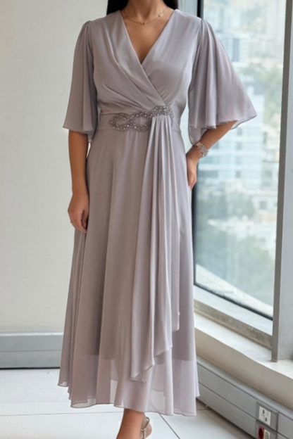 Vestido Midi Fluido – Elegância Graciosa