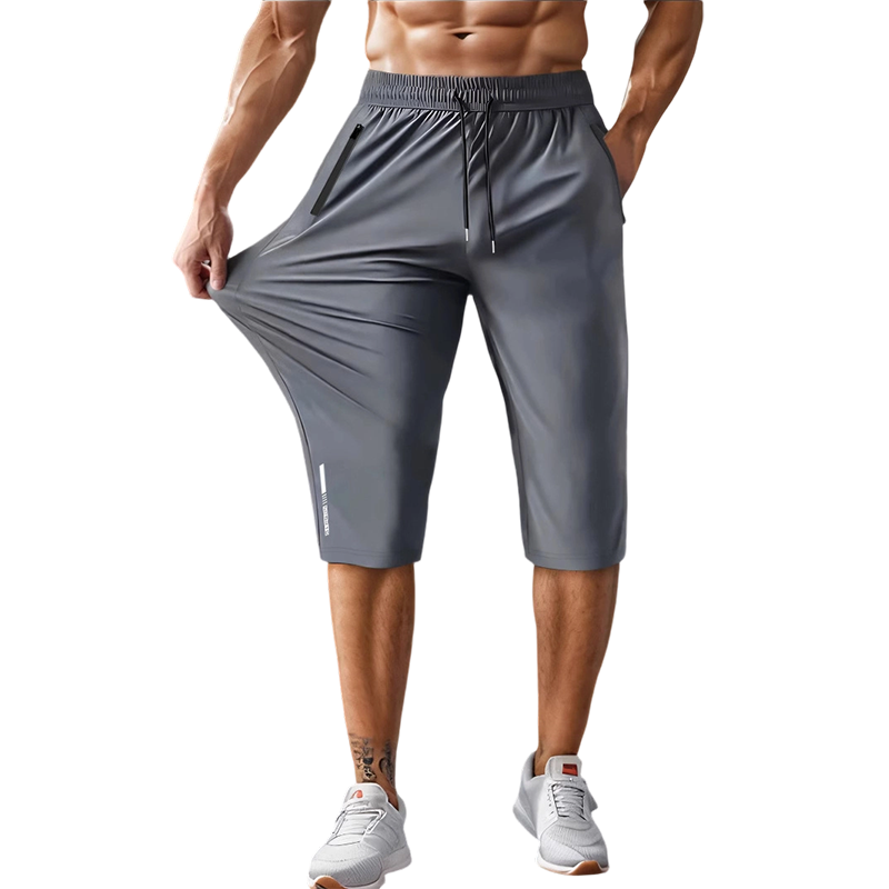 Kastoria — Pantalon Capri de Sport à Séchage Rapide avec Poches Zippées