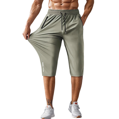 Kastoria — Pantalon Capri de Sport à Séchage Rapide avec Poches Zippées