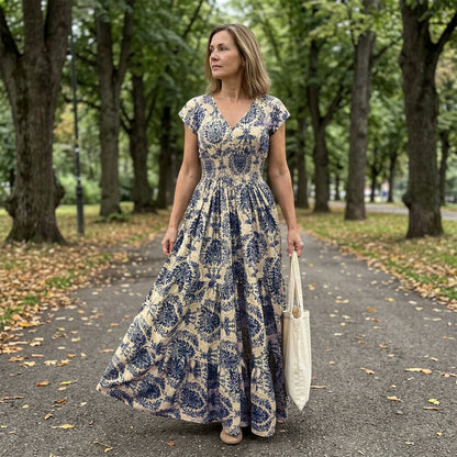 Marchetti — Robe à fleurs avec décolleté en V et détails froncés, longueur maxi